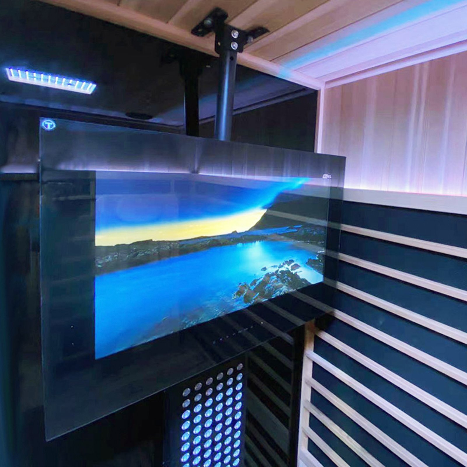 Sauna TV hanging from ceiling