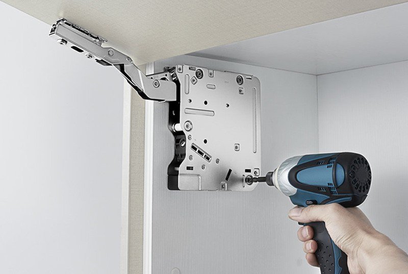 Kitchen Cabinet Television lift being installed